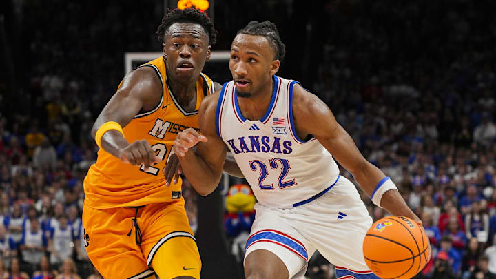 Kansas guard Darryn Peterson drives against Missouri forward Mark Mitchell during a game this season.