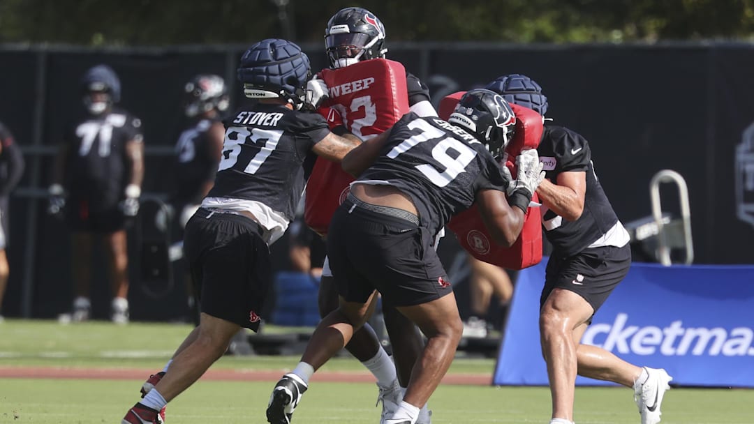 Jul 24, 2025; Houston, TX, USA; Houston Texans tight end Cade Stover (87) and Houston Texans Aireontae Ersery (79) during training camp at Houston Methodist Training Center. Mandatory Credit: Troy Taormina-Imagn Images