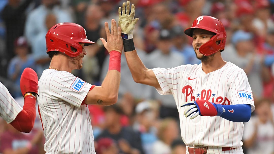 Aug 18, 2025; Philadelphia, Pennsylvania; Philadelphia Phillies shortstop Trea Turner (7) celebrates his three-run home run with outfielder Max Kepler (17) during the second inning against the Seattle Mariners at Citizens Bank Park. 