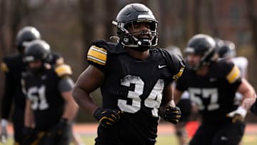 Iowa Hawkeye’s Jay Higgins runs during the team’s practice at Ensworth School in Nashville, Tenn., Friday, Dec. 27, 2024.