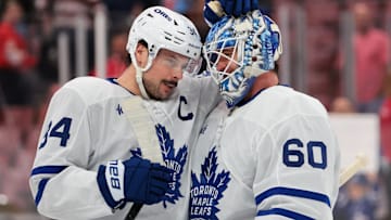 Dec 2, 2025; Sunrise, Florida, USA; Toronto Maple Leafs center Auston Matthews (34) celebrates with goaltender Joseph Woll (60) after the game against the Florida Panthers at Amerant Bank Arena. Mandatory Credit: Sam Navarro-Imagn Images