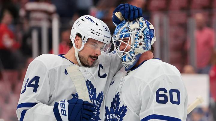 Dec 2, 2025; Sunrise, Florida, USA; Toronto Maple Leafs center Auston Matthews (34) celebrates with goaltender Joseph Woll (60) after the game against the Florida Panthers at Amerant Bank Arena. Mandatory Credit: Sam Navarro-Imagn Images
