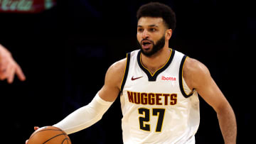 Feb 8, 2024; Los Angeles, California, USA; Denver Nuggets guard Jamal Murray (27) dribbles during a game against the Lakers. 