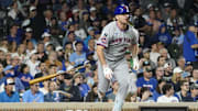 Sep 23, 2025; Chicago, Illinois, USA; New York Mets first baseman Pete Alonso (20) hits a RBI single against the Chicago Cubs during the sixth inning at Wrigley Field. Mandatory Credit: David Banks-Imagn Images