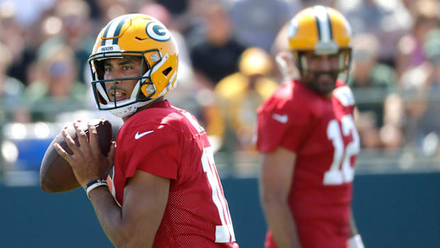 Green Bay Packers quarterback Jordan Love and New York Jets quarterback Aaron Rodgers
