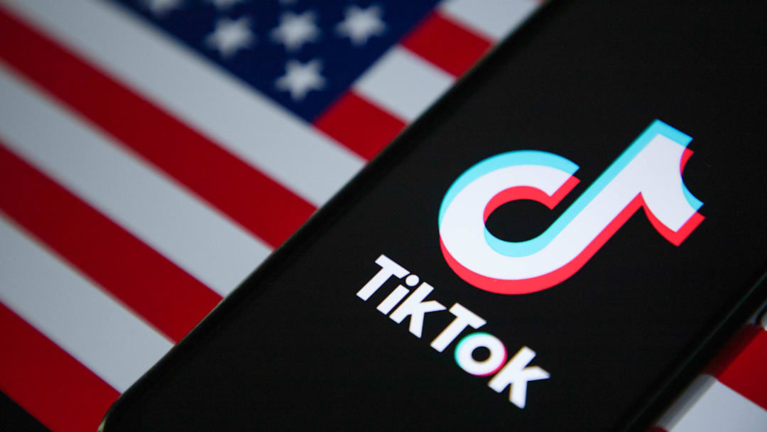 In this photo illustration, the TikTok logo is seen...