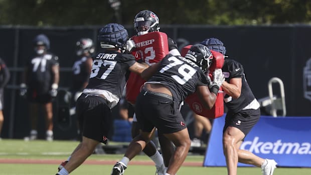 Jul 24, 2025; Houston, TX, USA; Houston Texans tight end Cade Stover (87) and Houston Texans Aireontae Ersery (79) during tra