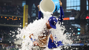 Robbie Grossman gets the first ice bath of 2023 for the Texas Rangers. 