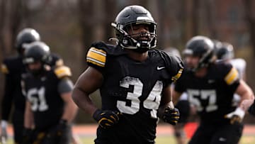 Iowa Hawkeye’s Jay Higgins runs during the team’s practice at Ensworth School in Nashville, Tenn., Friday, Dec. 27, 2024.