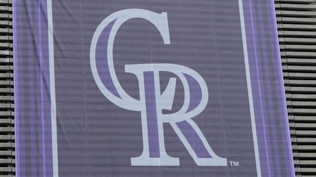 A banner with the Colorado Rockies logo at Estadio Alfredo Harp Helu.  