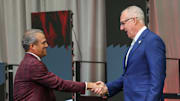 Jul 14, 2025; Atlanta, GA, USA; South Carolina Gamecocks head coach Shane Beamer and SEC commissioner Greg Sankey shake hands during SEC Media Day at Omni Atlanta Hotel. Mandatory Credit: Jordan Godfree-Imagn Images