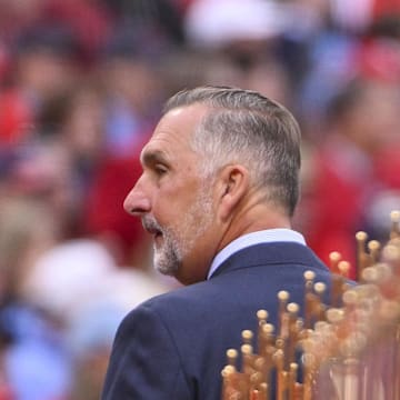 Mar 27, 2025; St. Louis, Missouri, USA;  St. Louis Cardinals president of baseball operations John Mozeliak looks on during opening day ceremonies before the game between the Cardinals and the Minnesota Twins at Busch Stadium. Mandatory Credit: Jeff Curry-Imagn Images