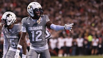 Travis Hunter #12 of the Colorado Buffaloes reacts during the first quarter against the Cincinnati Bearcats at Folsom Field on October 26, 2024 in Boulder, Colorado.