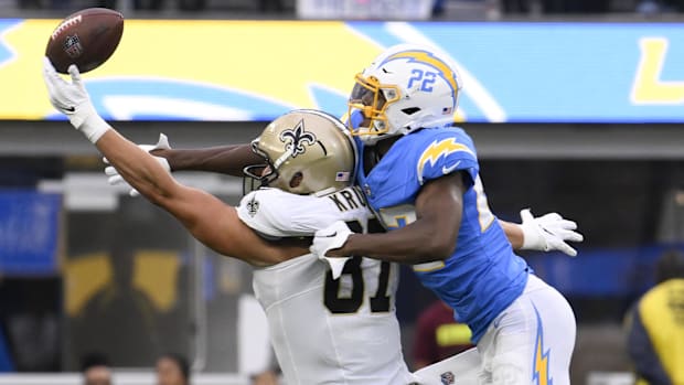 Los Angeles Chargers safety JT Woods (22) tries to breakup a pass