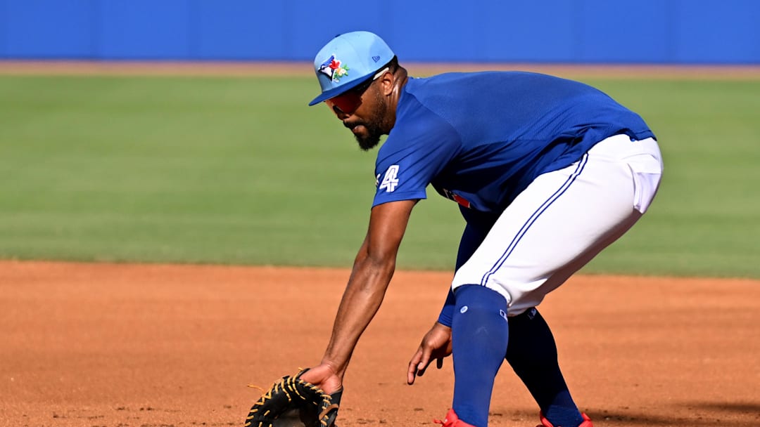 Feb 19, 2026; Dunedin, FL, USA; Toronto Blue Jays infielder Eloy Jimenez (74) fields a ground ball  during spring training at Bobby Mattick Training Center at Englebert Complex. Mandatory Credit: Jonathan Dyer-Imagn Images
