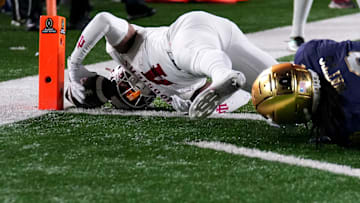 Indiana Hoosiers wide receiver Myles Price (4) scores a touchdown during the second half of a game between the Indiana Hoosiers and the Notre Dame Fighting Irish in first round of the College Football Playoff on Saturday, Dec. 21, 2024, in South Bend. Notre Dame defeated Indiana 27-17.