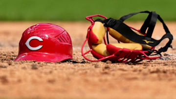 Cincinnati Reds catcher Austin Romine   s (28) helmet and mask rest in the dirt in the seventh of a baseball game against the Pittsburgh Pirates, Wednesday, Sept. 14, 2022, at Great American Ball Park in Cincinnati.

Mlb Pittsburgh Pirates At Cincinnati Reds Sept 14 7830