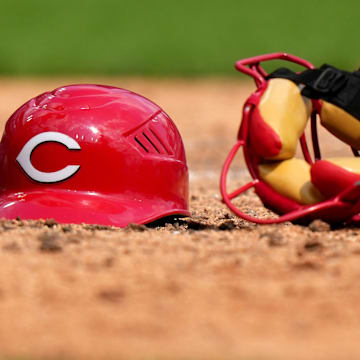 Cincinnati Reds catcher Austin Romine   s (28) helmet and mask rest in the dirt in the seventh of a baseball game against the Pittsburgh Pirates, Wednesday, Sept. 14, 2022, at Great American Ball Park in Cincinnati.

Mlb Pittsburgh Pirates At Cincinnati Reds Sept 14 7830