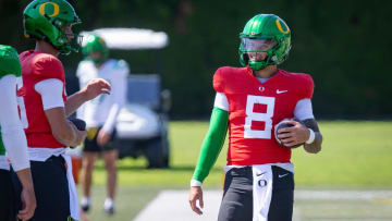 Oregon quarterback Dillon Gabriel walks the field during practice with the Ducks Tuesday, Aug. 13, 2024 at the Hatfield-Dowlin Complex in Eugene, Ore.