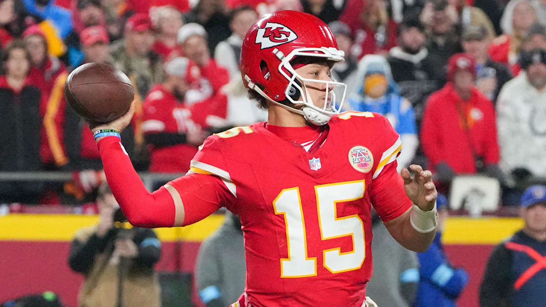 Dec 8, 2024; Kansas City, Missouri, USA; Kansas City Chiefs quarterback Patrick Mahomes (15) drops back to pass against the Los Angeles Chargers during the first half at GEHA Field at Arrowhead Stadium. Mandatory Credit: Denny Medley-Imagn Images