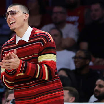 Oct 28, 2025; Miami, Florida, USA; Miami Heat guard Tyler Herro (14) reacts from the bench against the Charlotte Hornets during the fourth quarter at Kaseya Center. Mandatory Credit: Sam Navarro-Imagn Images