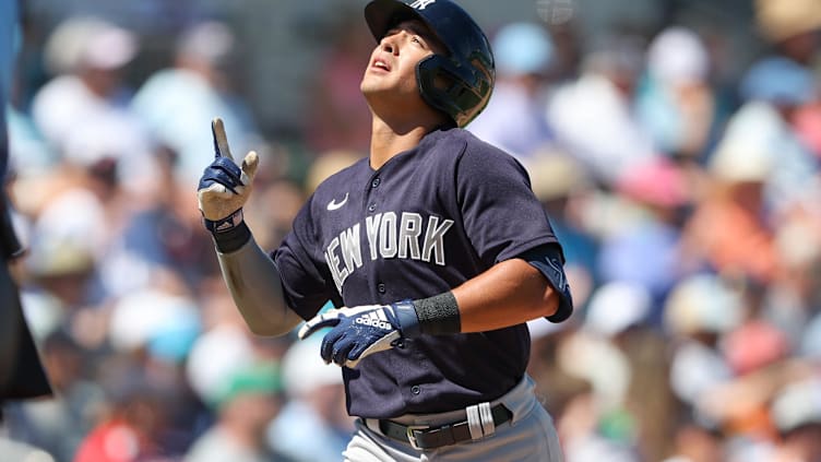 Mar 12, 2023; Fort Myers, Florida, USA;  New York Yankees shortstop Anthony Volpe (77) homers