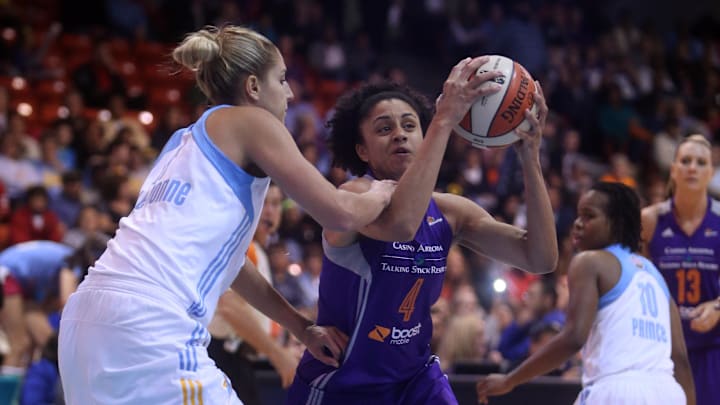 Sep 12, 2014; Chicago, IL, USA; Phoenix Mercury forward Candice Dupree (4) drives to the basket against Chicago Sky guard/forward Elena Delle Donne (11) during the first quarter in game three of the 2014 WNBA Finals at UIC Pavilion. Mandatory Credit: Jerry Lai-Imagn Images