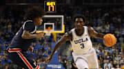 Nov 7, 2025; Los Angeles, California, USA;  UCLA Bruins forward Eric Dailey Jr. (3) dribbles the ball against Pepperdine Waves guard Aaron Clark (3) during the second half at Pauley Pavilion presented by Wescom Financial. Mandatory Credit: Kiyoshi Mio-Imagn Images