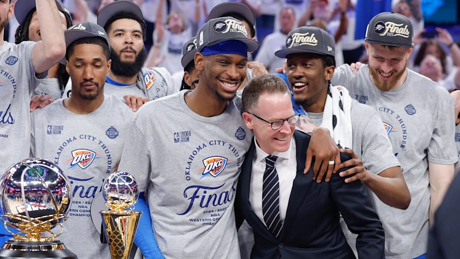 Oklahoma City Thunder guard Shai Gilgeous-Alexander hugs Oklahoma City Thunder executive vice president and general manager Sam Presti after their team defeated the Minnesota Timberwolves in game five of the western conference finals for the 2025 NBA Playoffs at Paycom Center. | Alonzo Adams-Imagn Images