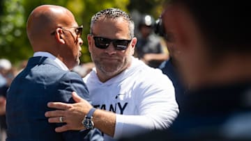 Penn State athletic director Pat Kraft greets head football coach James Franklin