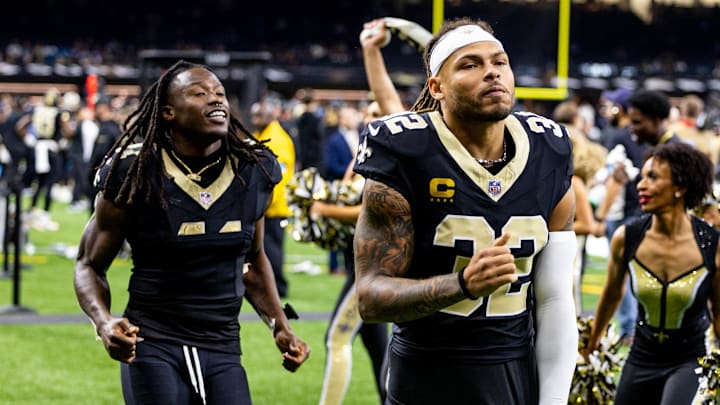 Sep 8, 2024; New Orleans, Louisiana, USA;  New Orleans Saints safety Tyrann Mathieu (32) and running back Alvin Kamara (41) head to the locker room after the game against the Carolina Panthers at Caesars Superdome. Mandatory Credit: Stephen Lew-Imagn Images