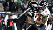 Eagles cornerback Quinyon Mitchell brings down Bears wide receiver DJ Moore in the Bears' 24-15 win on Black Friday.