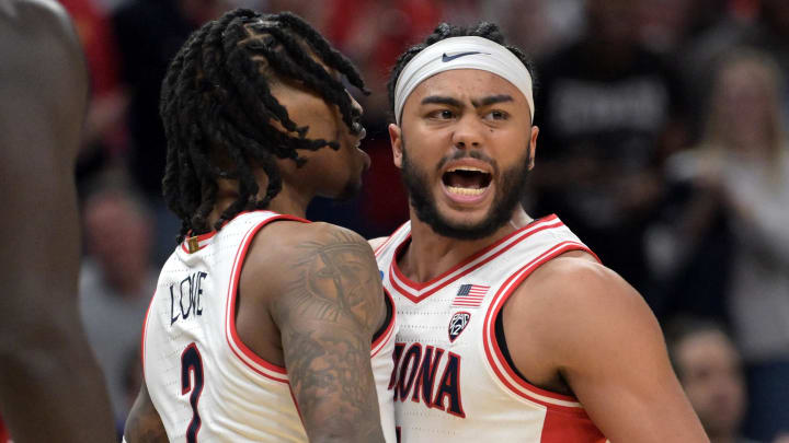 Mar 28, 2024; Los Angeles, CA, USA; Arizona Wildcats guard Kylan Boswell (4) and guard Caleb Love (2) react in the second half against the Clemson Tigers in the semifinals of the West Regional of the 2024 NCAA Tournament at Crypto.com Arena. Mandatory Credit: Jayne Kamin-Oncea-USA TODAY Sports