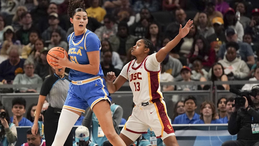 Mar 8, 2025; Indianapolis, IN, USA; UCLA Bruins center Lauren Betts (51) defends the ball from USC Trojans center Rayah Marshall (13) during the second half for the Big Ten Conference Championship at Gainbridge Fieldhouse. Mandatory Credit: Stephanie Amador Blondet-Imagn Images