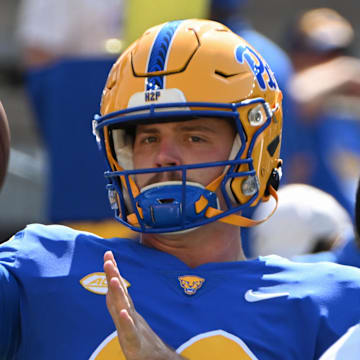 Sep 14, 2024; Pittsburgh, Pennsylvania, USA; Pittsburgh Panthers quarterback Eli Holstein (10) warms up before a game against the West Virginia Mountaineers at Acrisure Stadium. Mandatory Credit: Barry Reeger-Imagn Images