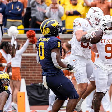 Texas running back Jerrick Gibson (9) celebrates a touchdown against Michigan during the first half at Michigan Stadium in Ann Arbor on Saturday, September 7, 2024.