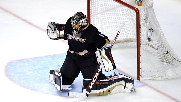 May 12, 2013; Anaheim, CA, USA; Anaheim Ducks goalie Jonas Hiller (1) blocks a shot against the Detroit Red Wings during the second period in game seven of the first round of the 2013 Stanley Cup Playoffs at the Honda Center. Mandatory Credit: Kelvin Kuo-Imagn Images