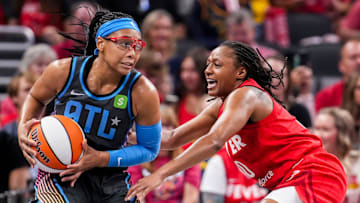 Indiana Fever guard Kelsey Mitchell (0) guards Atlanta Dream guard Allisha Gray (15) on Friday, July 11, 2025, during a game between the Indiana Fever and the Atlanta Dream at Gainbridge Fieldhouse in Indianapolis. The Indiana Fever defeated the Atlanta Dream, 99-82.