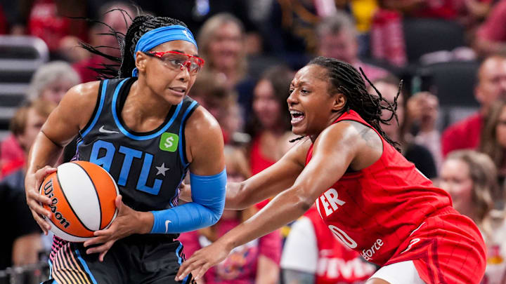 Indiana Fever guard Kelsey Mitchell (0) guards Atlanta Dream guard Allisha Gray (15) on Friday, July 11, 2025, during a game between the Indiana Fever and the Atlanta Dream at Gainbridge Fieldhouse in Indianapolis. The Indiana Fever defeated the Atlanta Dream, 99-82.