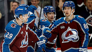 Mar 6, 2025; Denver, Colorado, USA; Colorado Avalanche center Nathan MacKinnon (29) celebrates his goal with left wing Artturi Lehkonen (62) and center Martin Necas (88) in the third period against the San Jose Sharks at Ball Arena. Mandatory Credit: Isaiah J. Downing-Imagn Images