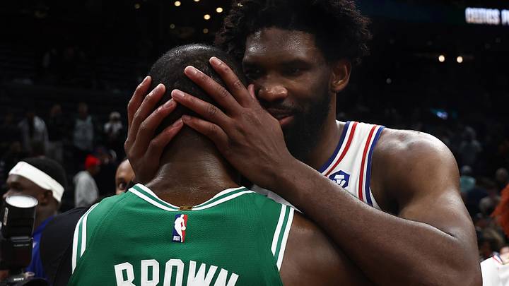 May 2, 2026; Boston, Massachusetts, USA; Philadelphia 76ers center Joel Embiid (21) talks with Boston Celtics guard Jaylen Brown (7) following game seven of the first round of the 2026 NBA Playoffs at TD Garden. Mandatory Credit: Winslow Townson-Imagn Images