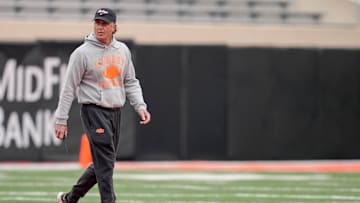Head coach Mike Gundy walks on the field during an Oklahoma State spring football showcase at Boone Pickens Stadium in Stillwater, Okla., Saturday, April 19, 2025.