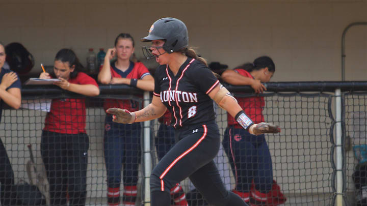 Taunton's Ava Venturelli celebrates as she heads home after hitting a three run home run during the 2023 MIAA Division I Softball championship game against Central Catholic.