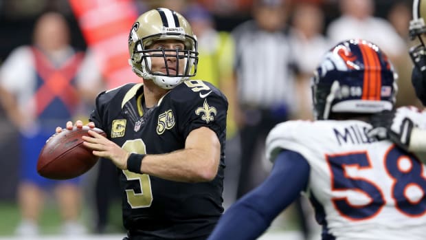Nov 13, 2016; New Orleans Saints quarterback Drew Brees (9) looks to throw against the Denver Broncos 