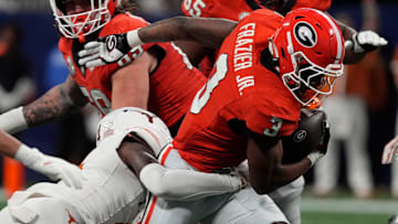 Georgia running back Nate Frazier (3) moves the ball during the first half of the SEC championship game against Texas in Atlanta, on Saturday, Dec. 7, 2024.