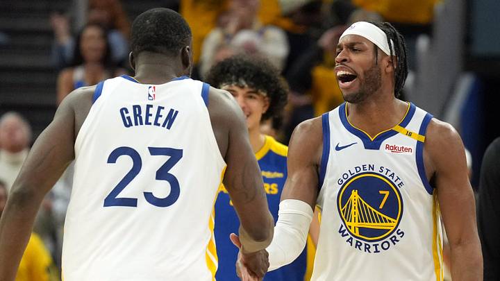Apr 26, 2025; San Francisco, California, USA; Golden State Warriors guard Buddy Hield (7) congratulates forward Draymond Green (23) during the fourth quarter of game three of first round for the 2024 NBA Playoffs against the Houston Rockets at Chase Center. Mandatory Credit: Darren Yamashita-Imagn Images