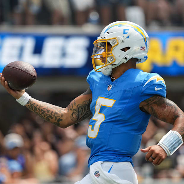 Los Angeles Chargers quarterback Trey Lance runs out of bounds during the second quarter against the New Orleans Saints.