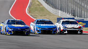 Ross Chastain (#1) makes an aggressive move on the opening lap of the EchoPark Automotive Grand Prix at Circuit of the Americas, which resulted in a spin for Chase Elliott (#9).