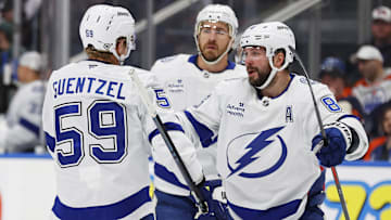 Dec 10, 2024; Edmonton, Alberta, CAN; The Tampa Bay Lightning celebrate a goal scored by  forward Jake Guentzel (59)during the second period against the Edmonton Oilers at Rogers Place. Mandatory Credit: Perry Nelson-Imagn Images