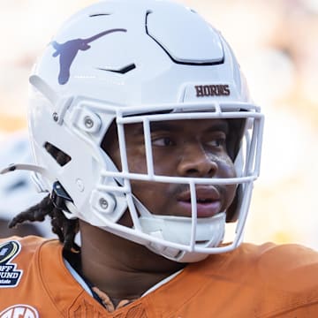 Dec 21, 2024; Austin, Texas, USA; Texas Longhorns offensive lineman Andre Cojoe (77) against the Clemson Tigers during the CFP National playoff first round at Darrell K Royal-Texas Memorial Stadium. Mandatory Credit: Mark J. Rebilas-Imagn Images